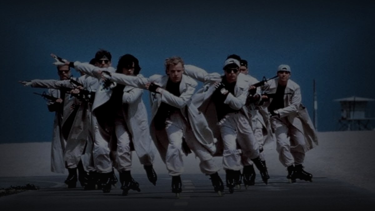 Still from prayer of the rollerboys (1990) — cinemascomics (yandex), downscaled from 1200x728, baked 39.1